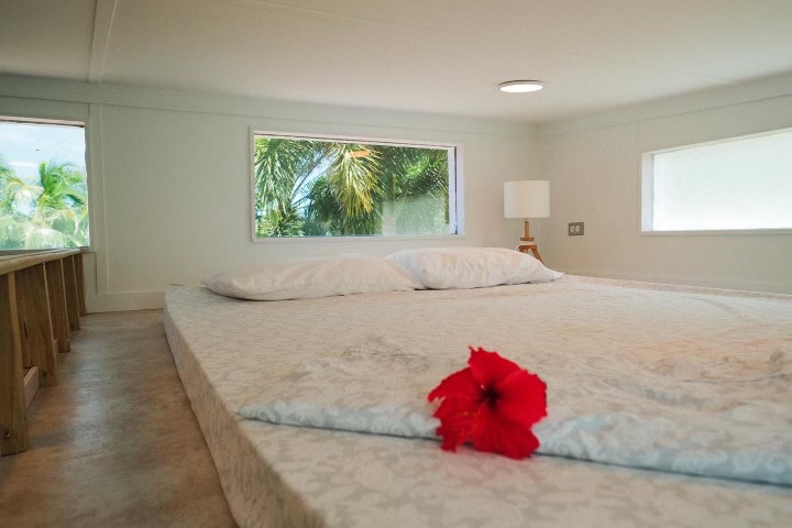Bright Bedroom with Red Flower on it